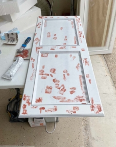 Cabinet door w lots of bondo