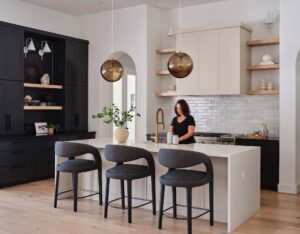 warm-modern-kitchen-for-studio-brownstone-with-cabinets-painted-in-benjamin-moore-inukshuk-smokey-taupe-and-sw-tricorn-black-by-paper-moon-painting-austin-tx