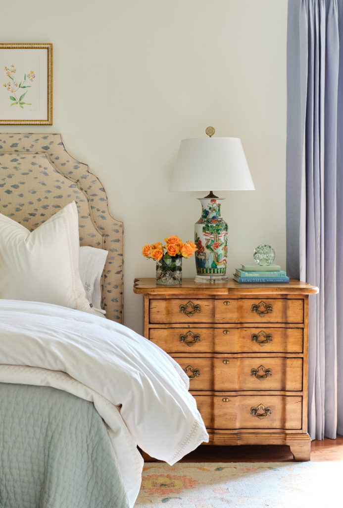Blues and lavenders provide pops of gentle color in this primary bedroom.