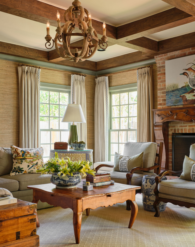 Grasscloth wraps this family room is coziness and warmth.