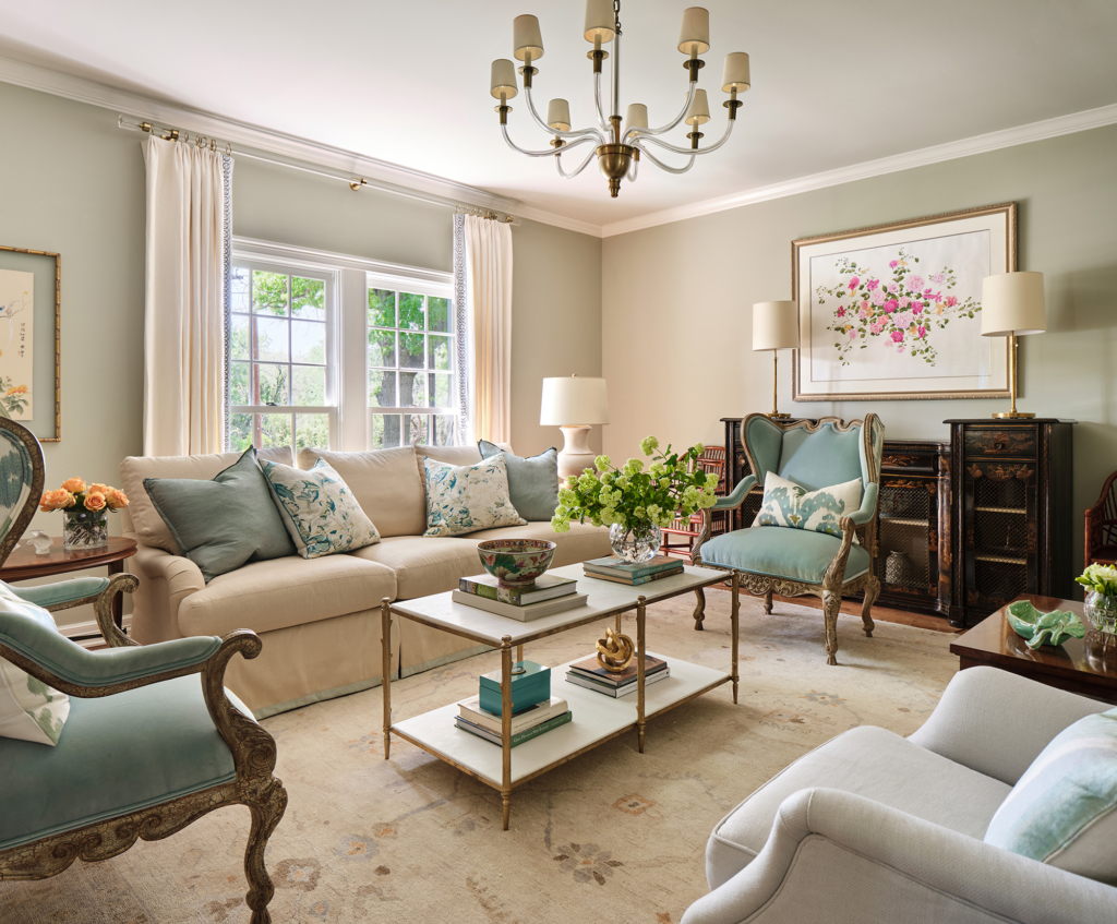 The living showcases antique pieces with modern classics, all with a soft, calming vibe.