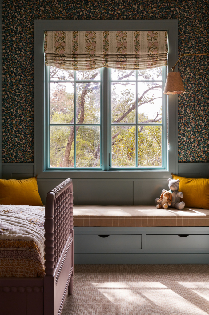 Guest room "Liberty of London" wallpaper with painted window seat and woodwork in Farrow & Ball "Dix Blue".