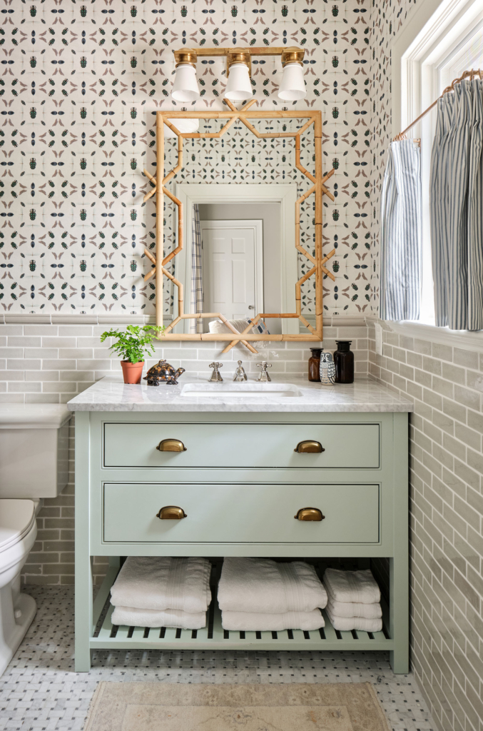 We installed this fun "beetle" wallpaper in a boy's bathroom, and painted this pale green vanity.