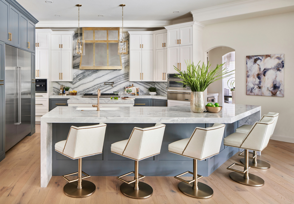 Fresh blue on the cabinets makes this modern kitchen a work of art.