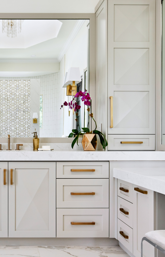 The unique profile of these cabinets make the primary bath feel truly custom.