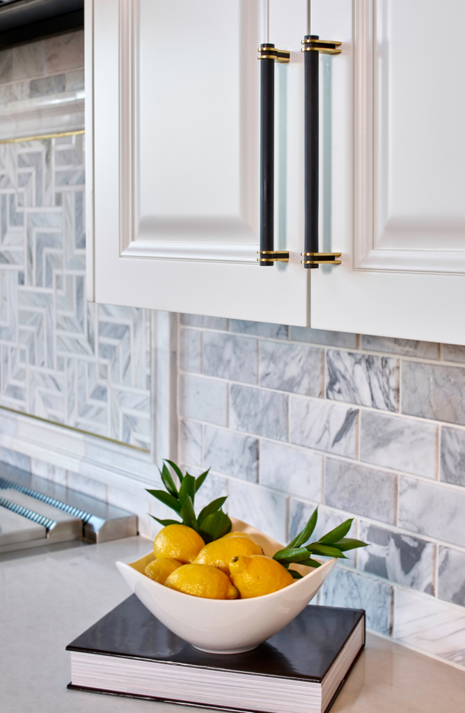 We love the leather-clad cabinet handles.