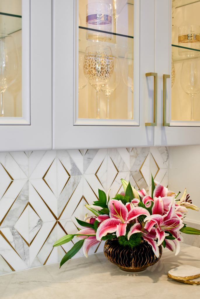 White cabinets painted in Sherwin Williams SW 7005 Pure White, expertly refinished by Paper Moon Painting, your trusted cabinet refinisher.