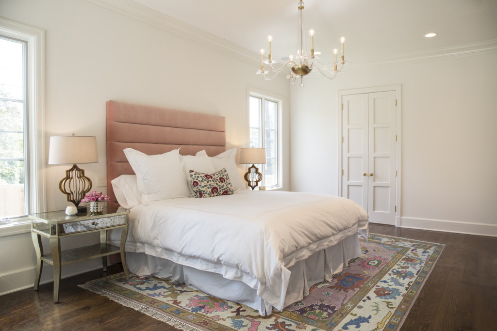 A serene, restful primary bedroom, painted in Sherwin Williams "Pure White".  Photo, Paper Moon Painting