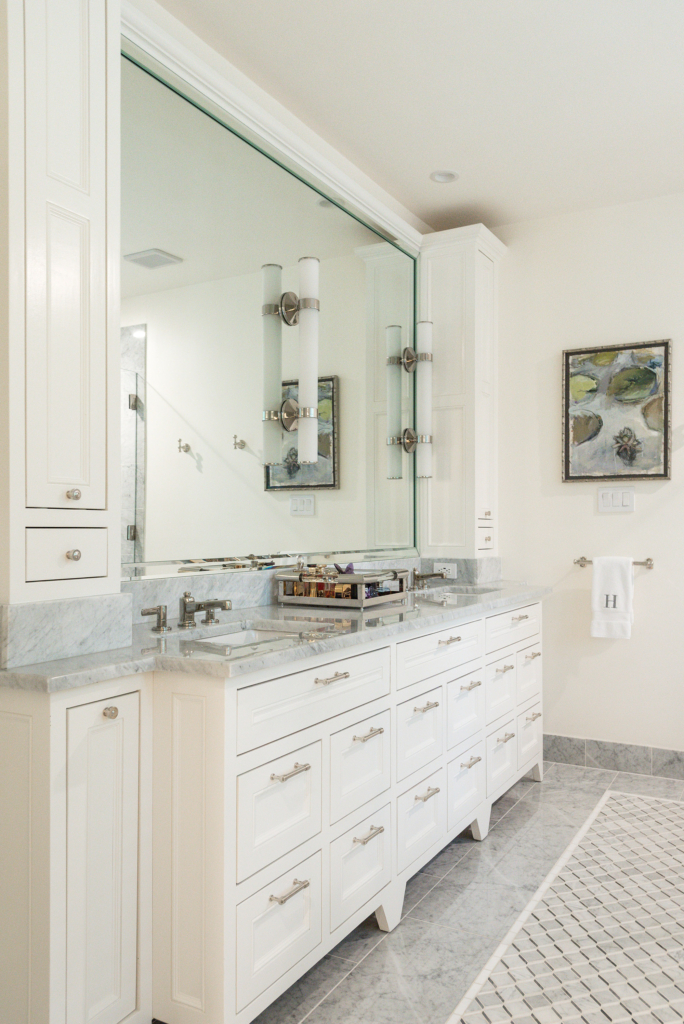 The designer touches in this elegant master bath feel like a European boutique hotel.