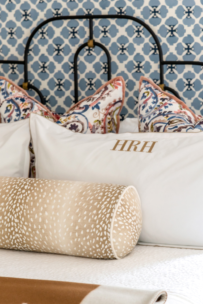 Close-up of the bedding and styling details in the guest room.