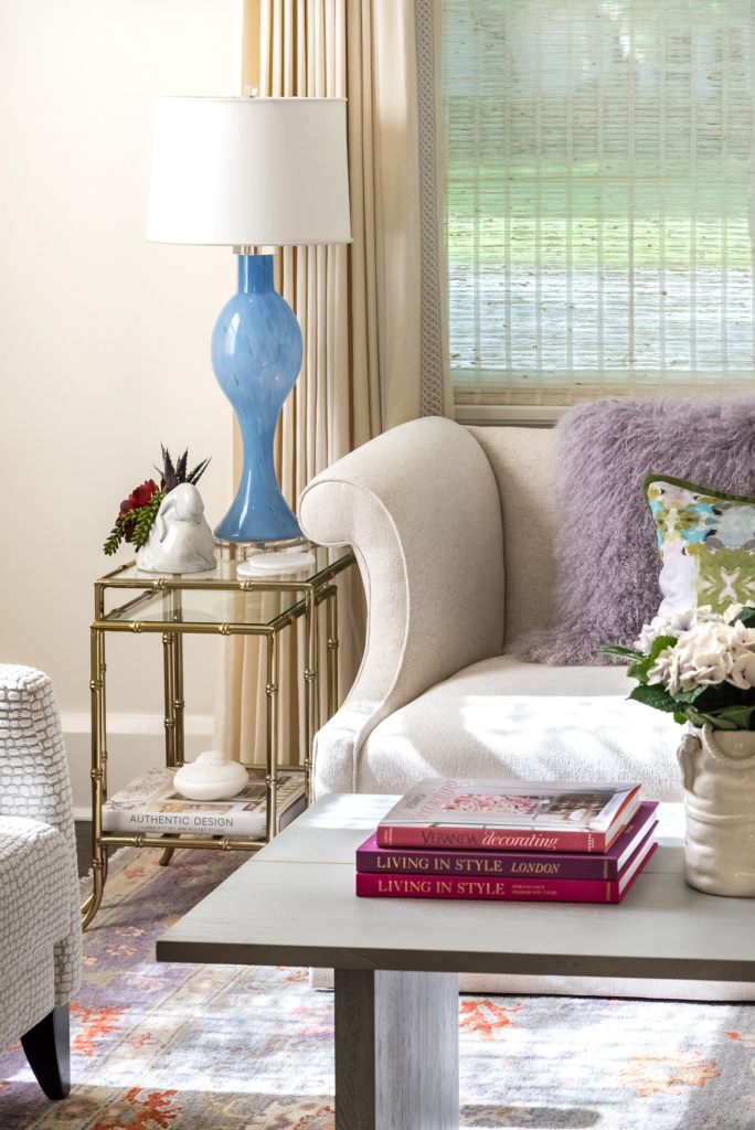 Crisp white walls and pastel accents in the welcoming formal living room.