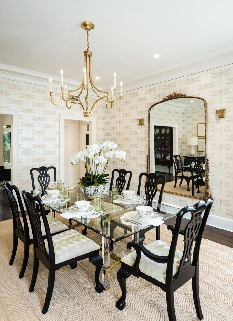 Wrapped in Harlequin's "Demoiselle" wallpaper, the dining room exudes timeless elegance.