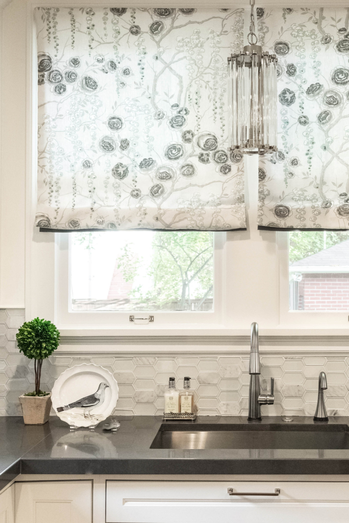 Sink area with soft, custom shades.
