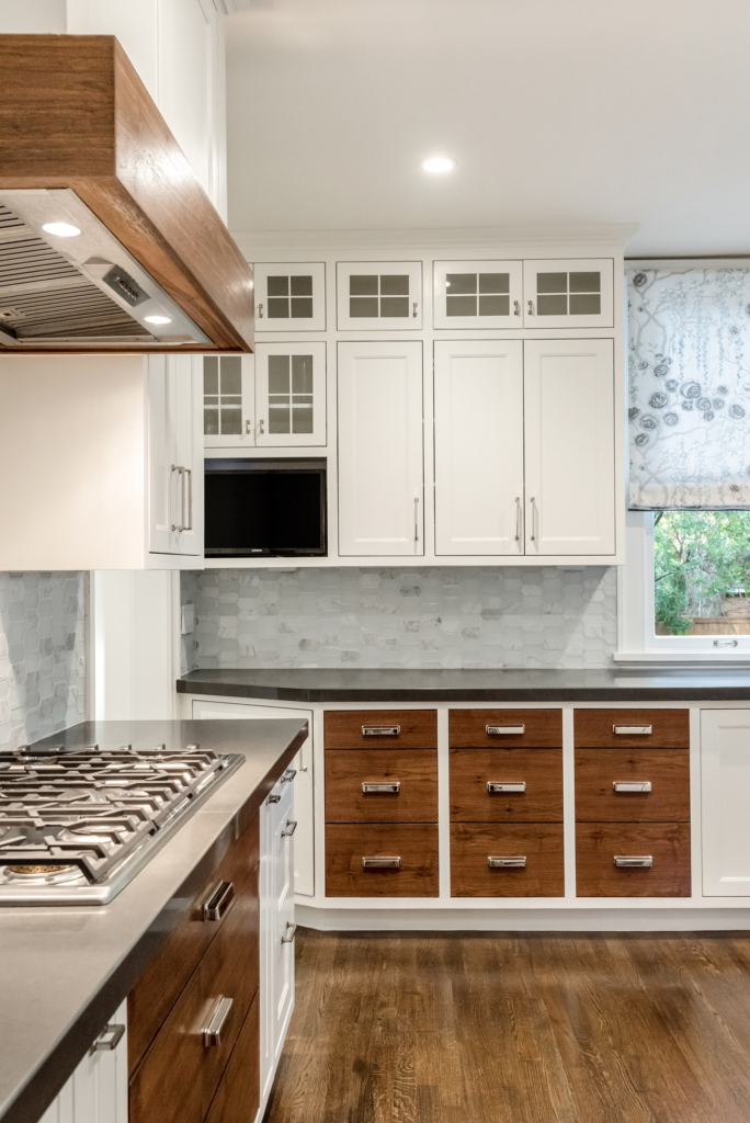 The wood details bring warmth to this custom kitchen.
