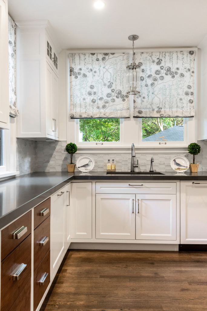 Side angle of the white and wood two-tone kitchen.