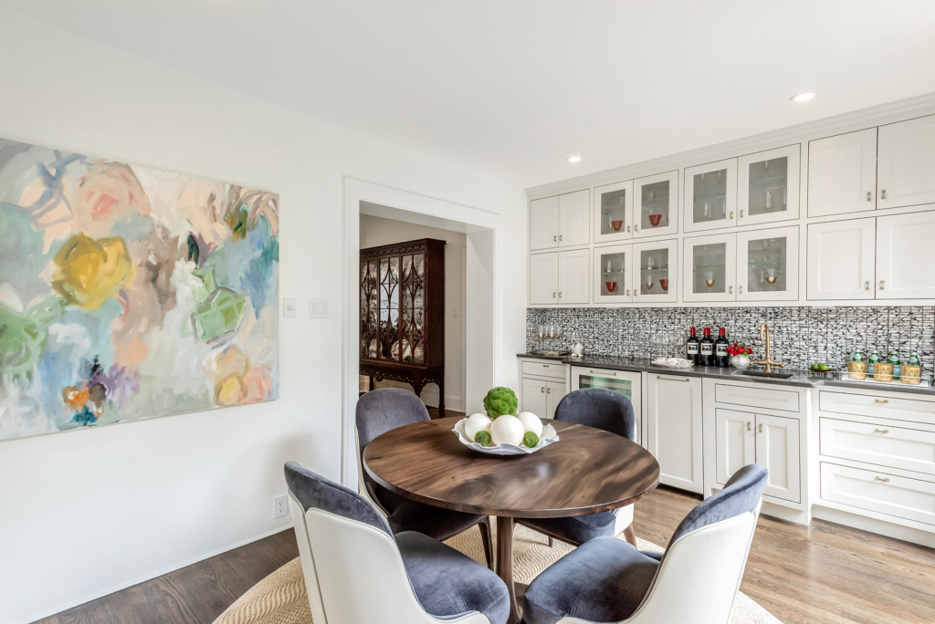 The breakfast area has its own cabinetry which functions as a bar and butler's pantry.