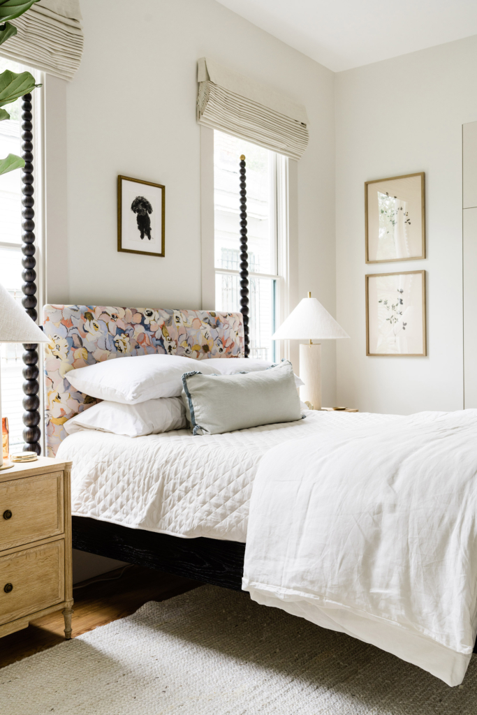This serene primary bedroom is painted in Farrow & Ball’s “All White,” featuring a four-poster Julian Chichester bed.