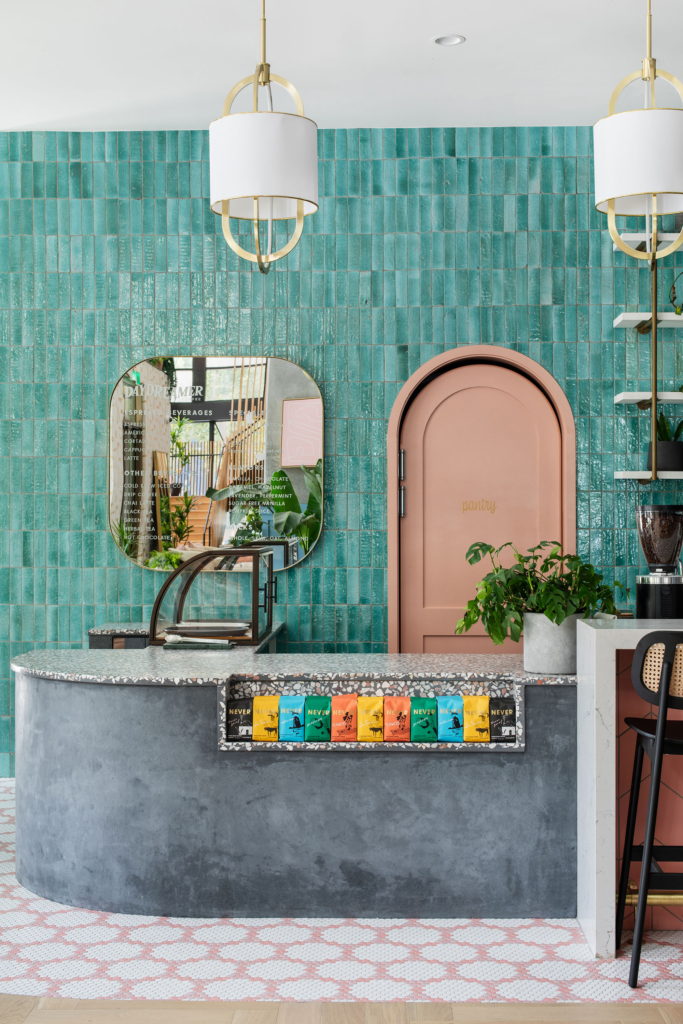 Coffee bar showing the concrete‑look plaster finish we installed around the bottom of the bar.