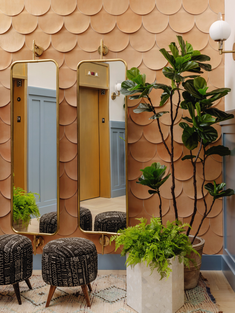 Elevator lobby detail showing the beautiful scallop-patterned leather tile by AVO we installed.