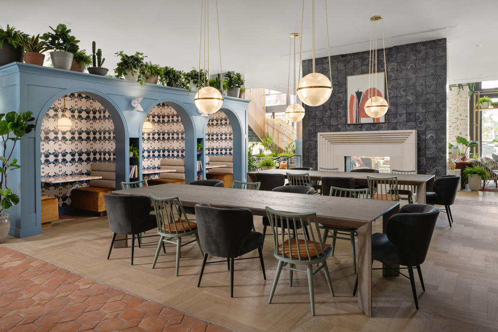 This lounge allows for both communal dining tables and cozier booths. 