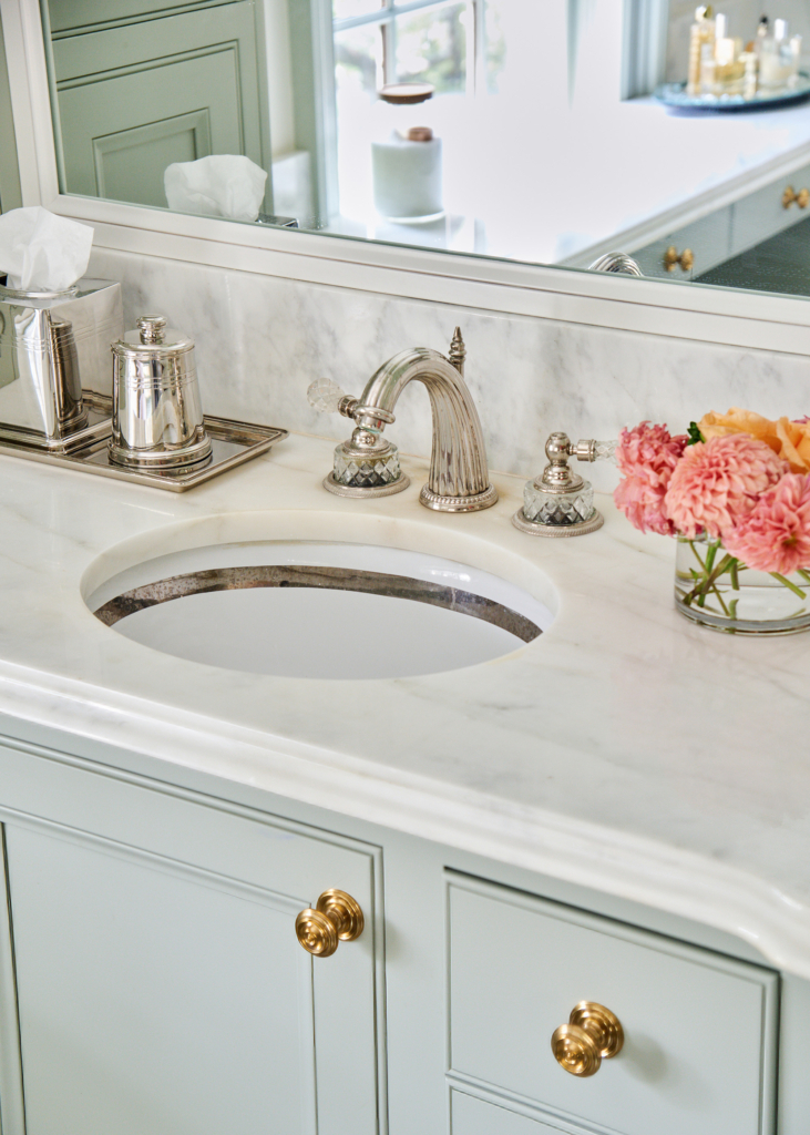 Primary bath cabinets painted in Farrow & Ball "Mizzle", detail.