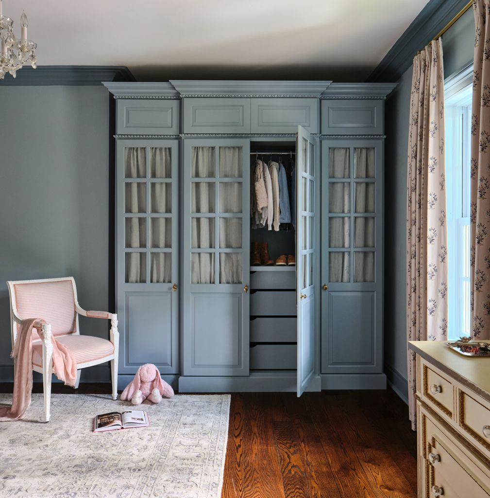 Traditional kids bedroom with walls and custom closet painted in Farrow and Ball "Yonder"