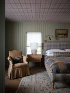 chasing-paper-vintage-plaid-wallpapered-ceiling-and-striped-wallpaper-on-walls-in-primary-bedroom