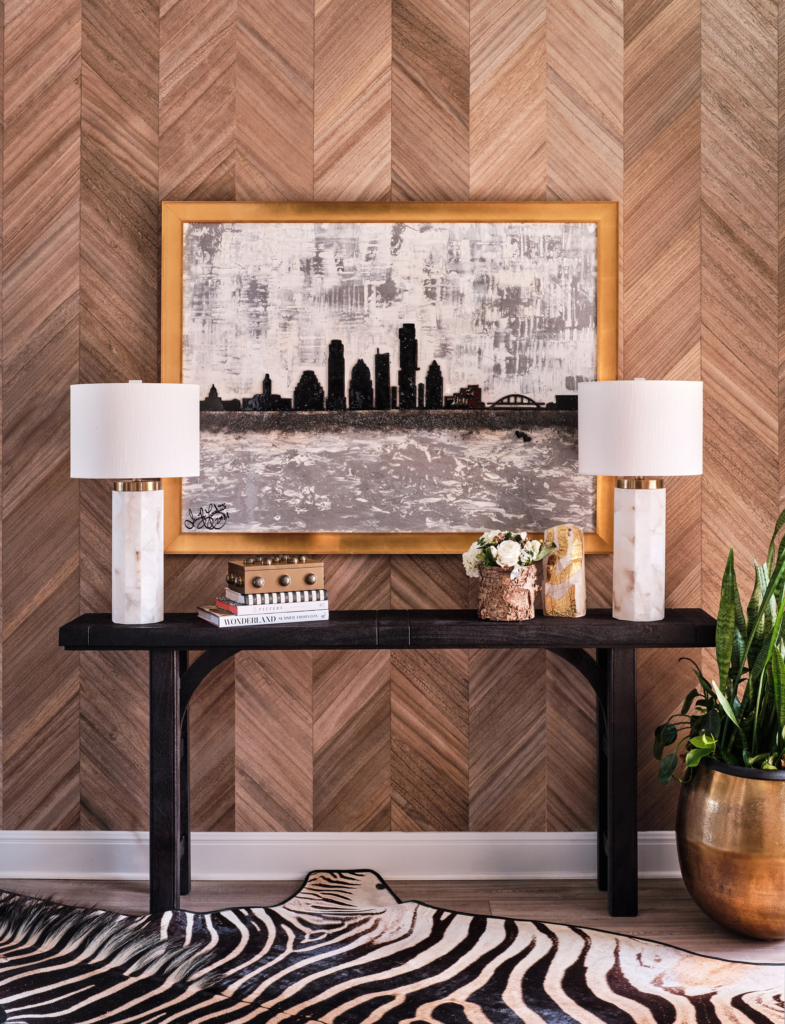 Thibaut's "Inyo" wood veneer chevron-patterned wallcovering is perfect in the home entry foyer.