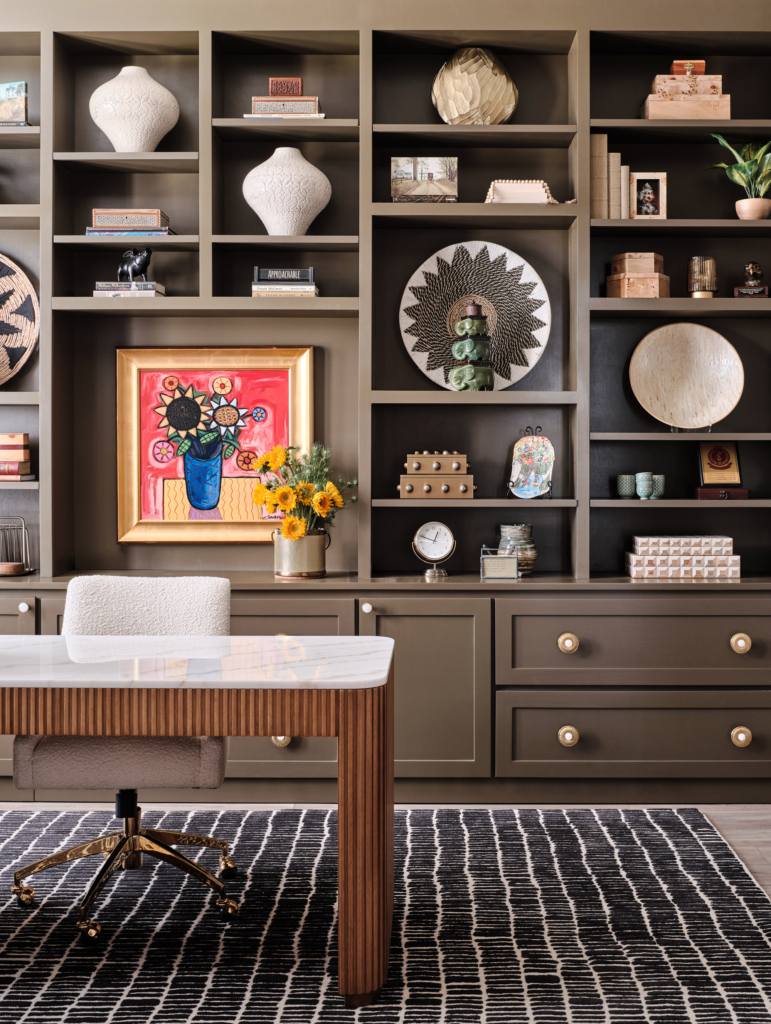 Home office featuring walls and built-in cabinets in Sherwin Williams "Porpoise", designed for style and functionality.