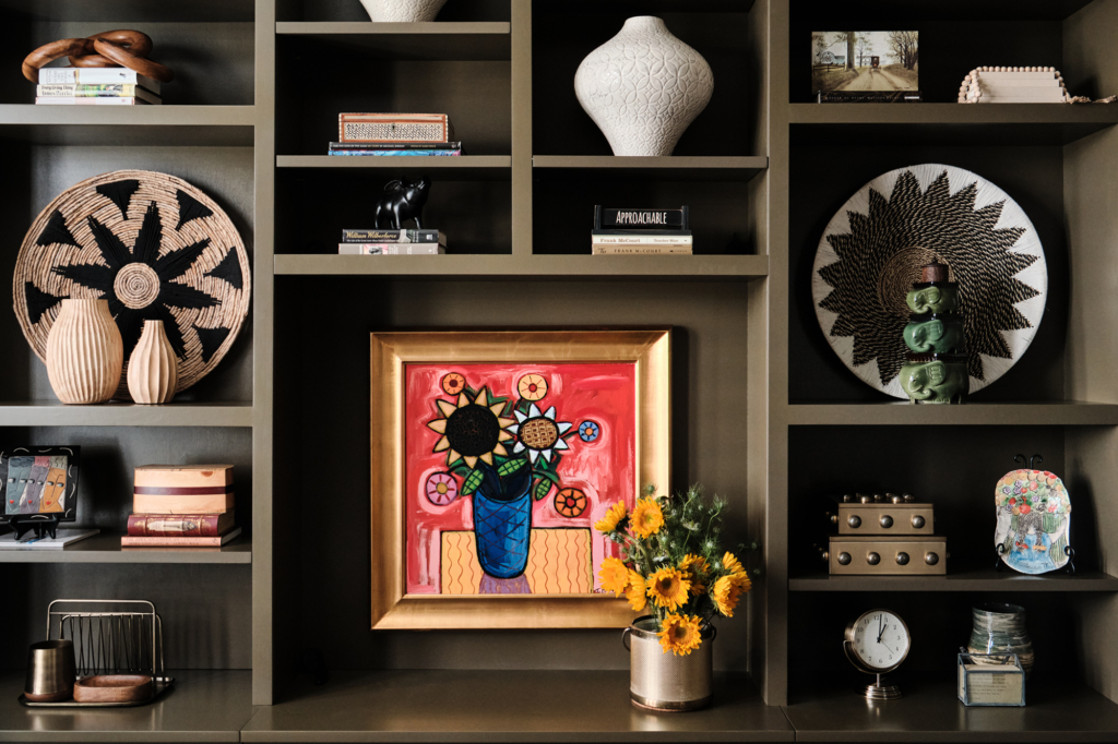 Sherwin Williams "Porpoise" is the perfect rich, warm color for the built-in bookshelves in this home office.