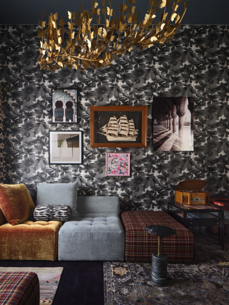 Side wall in the game room lounge featuring Harlequin "Grounded" wallpaper, designed by Rhydima Brar. A dynamic and playful design.