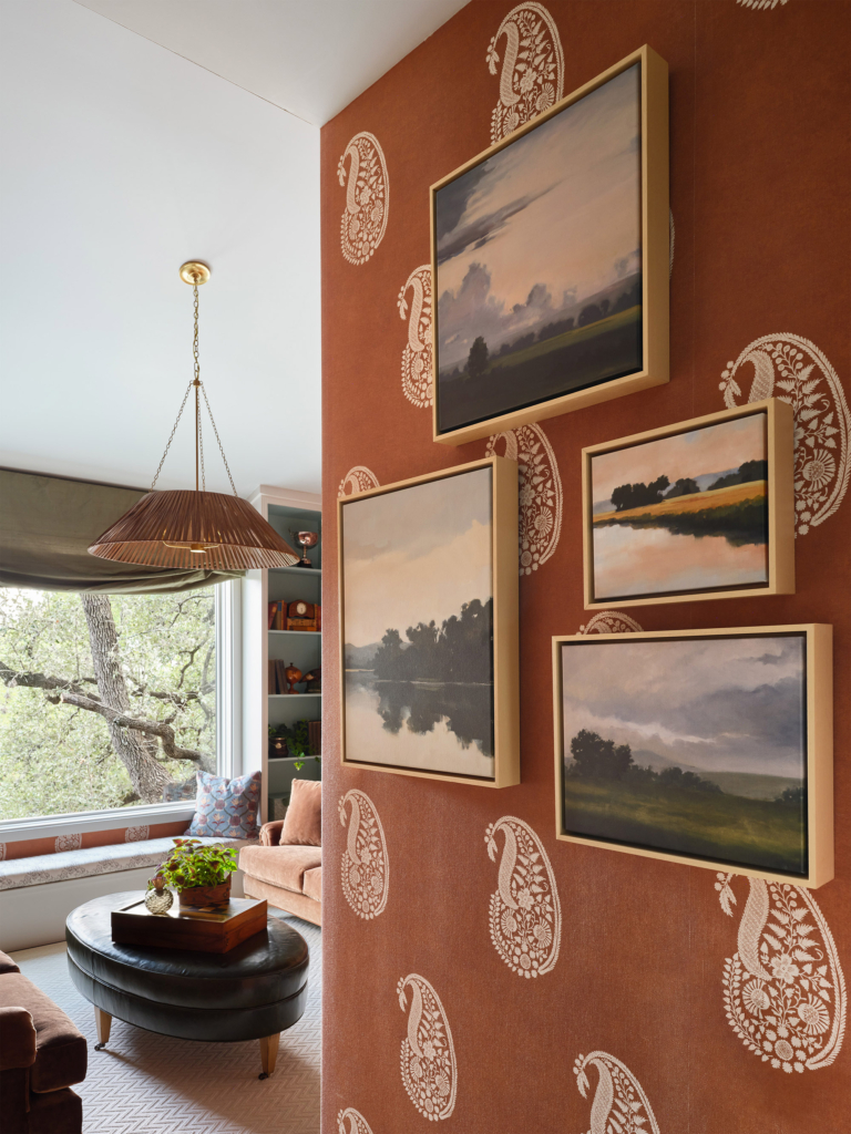 Entry wall in guest lounge area featuring Phillip Jeffries custom orange bandana wallpaper, by Leah O’Connell. A vibrant and welcoming introduction to the space.