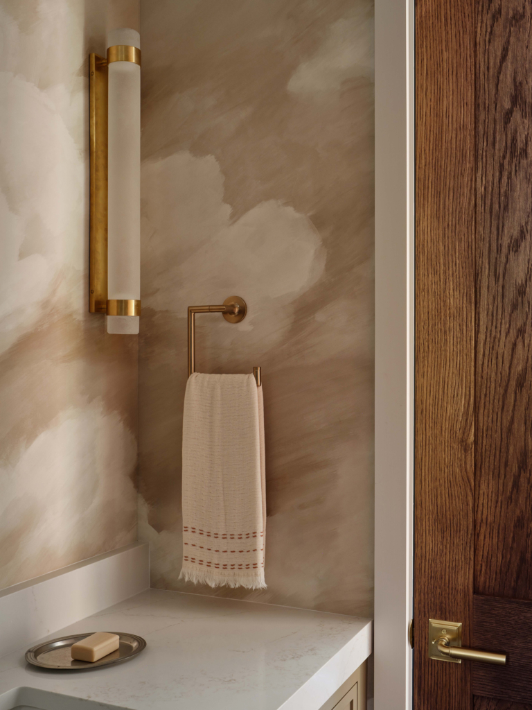 Detail of Harlequin's "Air" in Golden Light wallpaper in the primary bath, design by Sara Malek Barney.