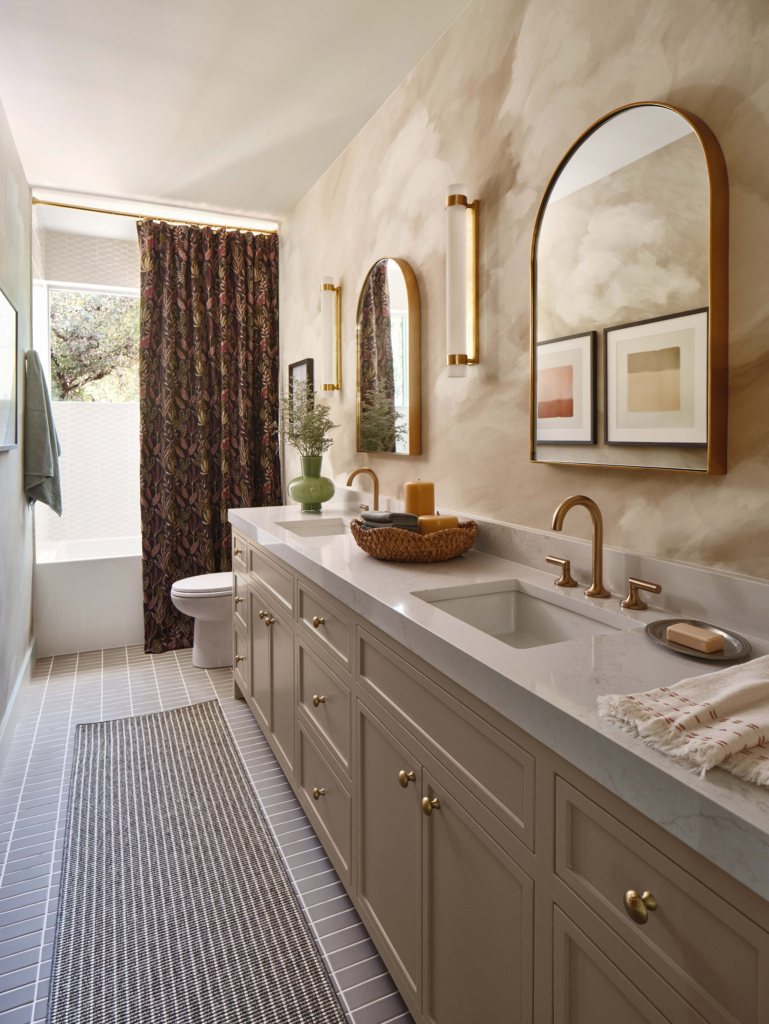 Primary bathroom featuring Harlequin "Air" in Golden Light wallpaper in warm neutrals, designed by Sara Malek Barney.  Perfect for a spa-like bath atmosphere!
