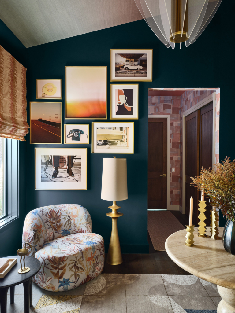 Gallery wall in lounge with ceiling with Phillip Jeffries "Mirage Sunbaked" wallpaper at the House Beautiful Whole Home 2025 in Austin, designed by Amber Guyton. 