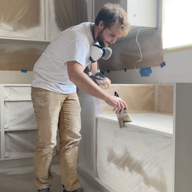 scott dusting off cabinet painting papermoon painting