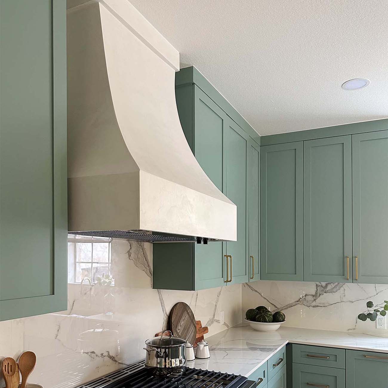 Venetian-plaster-kitchen-range-hood-rollingwood-texas