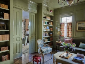 green-living-area-with-high-gloss-paneled-walls-by-hughes-and-lutz-interiors